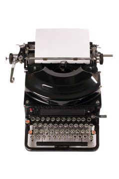 Old typewriter isolated on white background