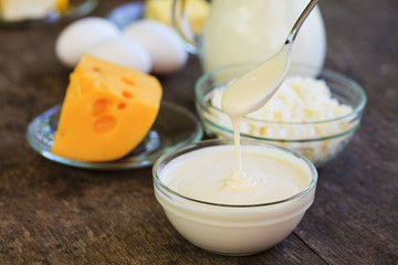 Dairy products on wooden table