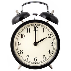Black Alarm Clock isolated on white, showing two o'clock