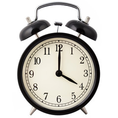 Black Alarm Clock isolated on white, showing four o'clock