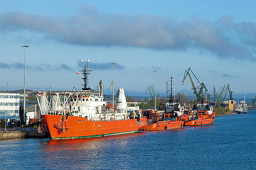 Tugboats in a row