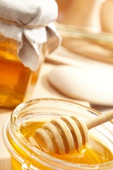 Honey with wood stick