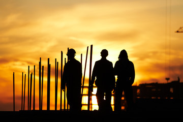 Builders at Sunset