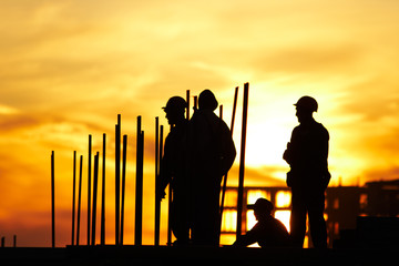 hard workers at sunset