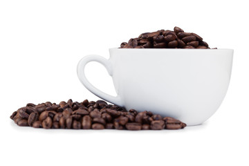 Cup full of coffee beans