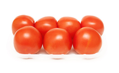 tomatoes in plastic plate