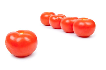 Some red tomatos in group isolated