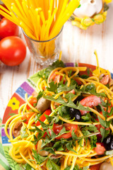 Spaghetti with olives, tomatoes and herbs