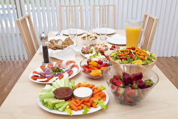 Dining Table Laid For a Healthy Salad Lunch