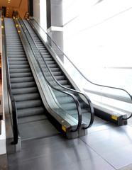 escalator in modern interior © sutsaiy