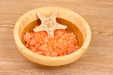 Fototapeta na wymiar Seastar and aromatic salt in bowl