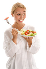 Woman eating salad