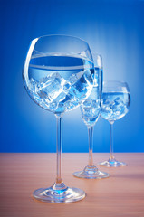 Water in the glass against gradient background