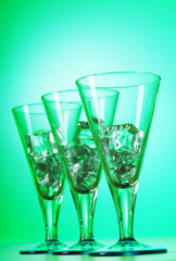 Glasses of water against gradient background