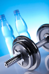 Obraz premium dumbell and mineral water
