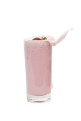 Splashing strawberry milkshake