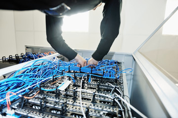 young it engeneer in datacenter server room