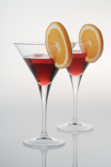 Two colorful drinks on white background