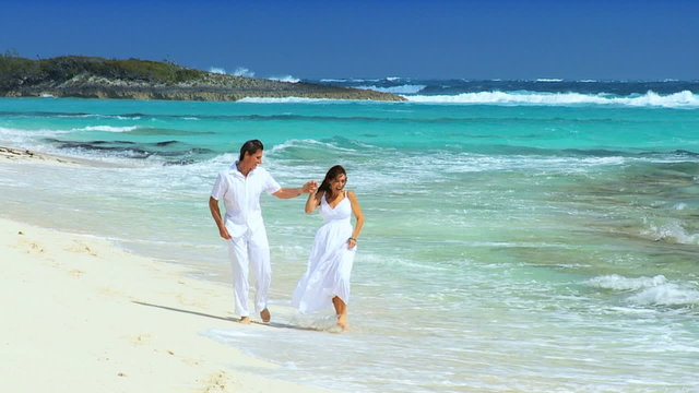 Happy Couple Enjoying Luxury Beach Vacation