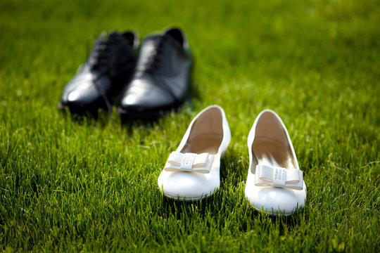 wedding shoes in the grass field