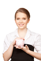 lovely woman with piggy bank