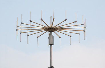 large antenna on blue sky background