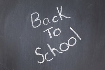 Blackboard with "back to school" written on it
