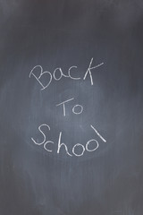 Blackboard with "back to school" written on it