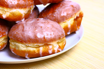 Delicious dessert made of several glazed donuts