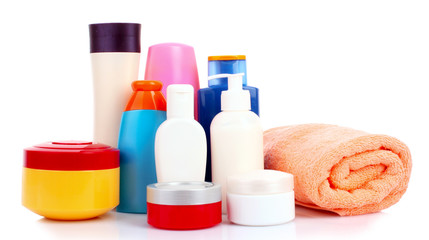 bottles of health and beauty products isolated on white