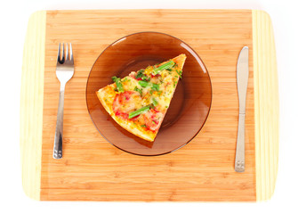 Pizza on plate with fork and knife