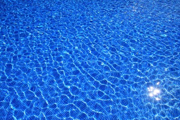 blue tiles swimming pool water reflection texture