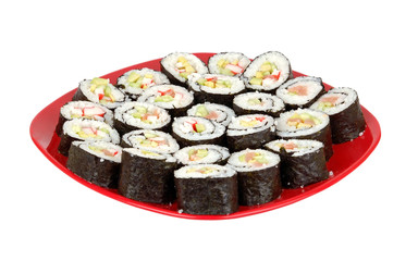 Japanese cuisine - sushi roll on red plate on white backround