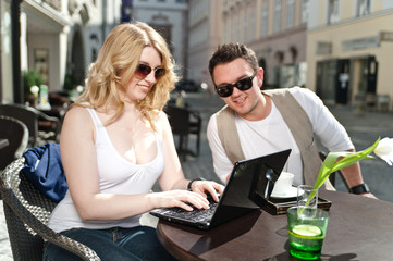 Couple looking at the Laptop