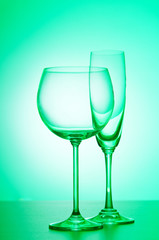 Wine glasses against gradient background