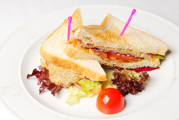 Sandwich with beef on a whitw plate