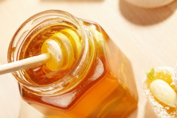 Honey with wood stick