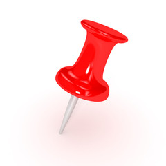 Red thumbtack over white background
