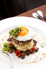 beef burger with egg and potatoes