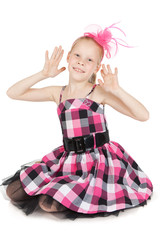 Little girl with pink hat over white