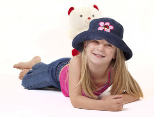Little girl with playful denim hat
