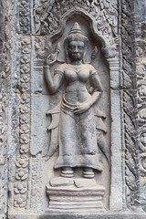 Fototapeta na wymiar Фрагмент барельефа. Ангкор Ват, Сиемрип, Камбоджа