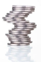 Unstable stack of silver coins
