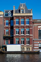 Naklejka premium Amsterdam, casa sul canale