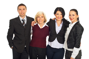 Four business people huddling in a row