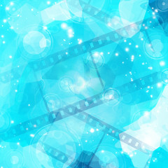 film strip on glowing blue background