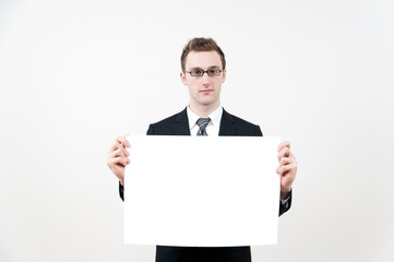 young businessman with blank whiteboard