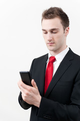 young businessman using smartphone