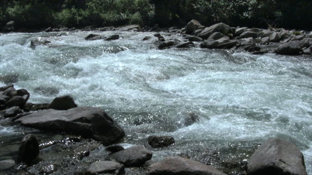alpine stream between stones (with sound)