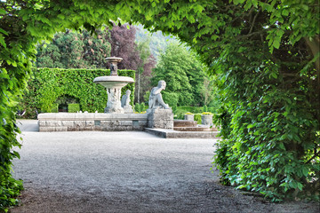 A fountain in the park of roses. Germany, Baden-Baden.